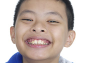 Smiling kid with good dental health