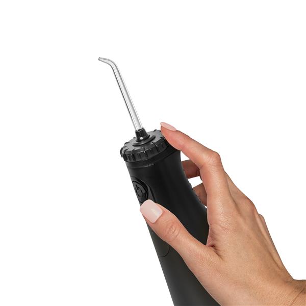 Black Cordless Plus 5000 handheld water flosser handle and EASYSPIN 360° rotating tip, shown held in a hand for scale.