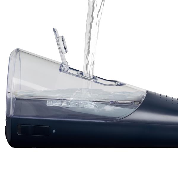 Filling the water reservoir of the Blue Cordless 1000 handheld water flosser.
