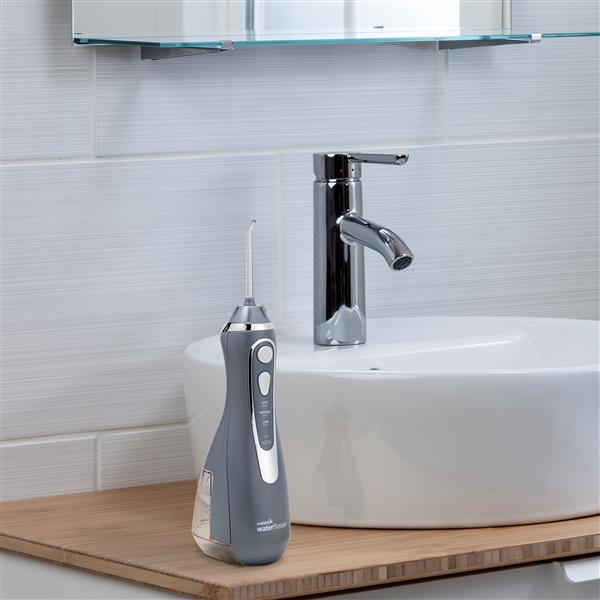 Modern Gray Cordless Advanced Water Flosser WP-567 In Bathroom