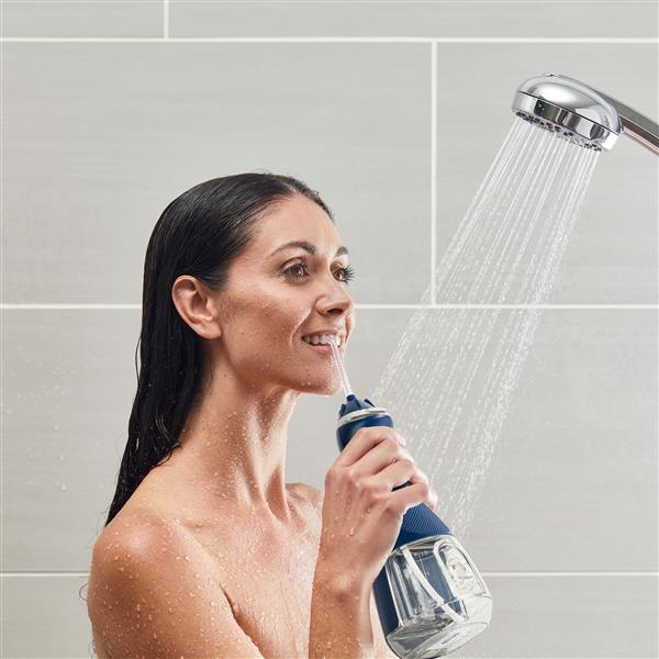 Using Blue Cordless Advanced Water Flosser WP-583 in Shower