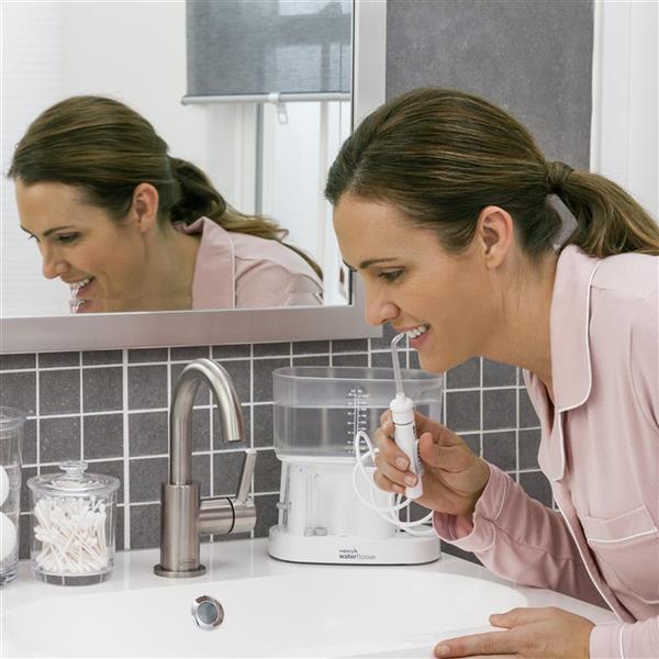 Using WP-72 White Classic Professional Water Flosser