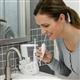 Using White Complete Care 5.5 Water Flosser Toothbrush