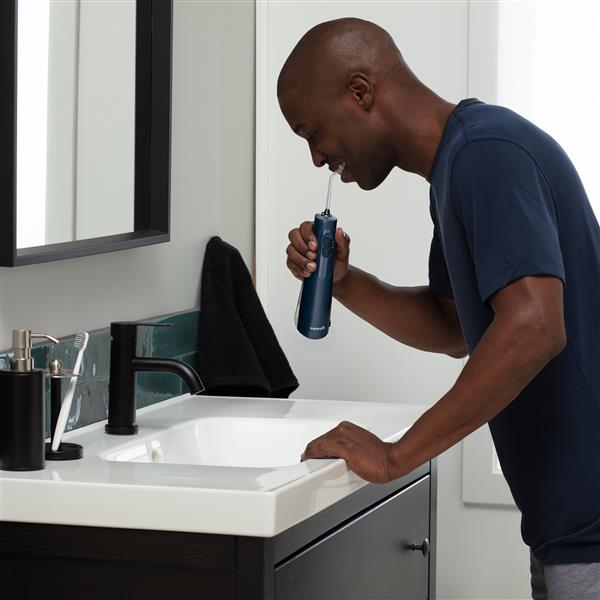 Using WF-21 Blue Cordless Enhance Water Flosser