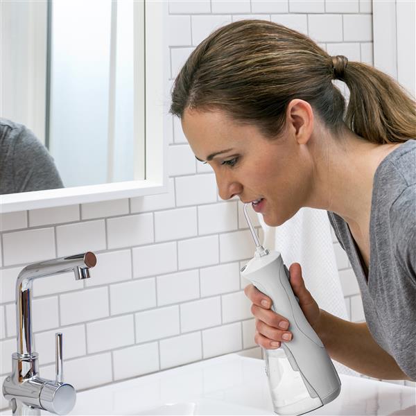 Using WP-450 White Cordless Plus Water Flosser