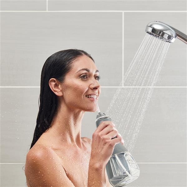 Using Gray Cordless Advanced Water Flosser WP-587 in Shower