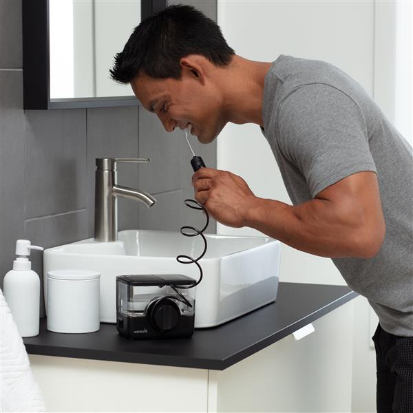 Using WF-12CD022-4 Black ION Cordless Water Flosser