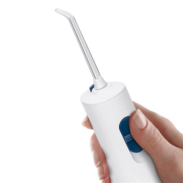 White Cordless 1000 handheld water flosser handle, shown held in a hand for scale.