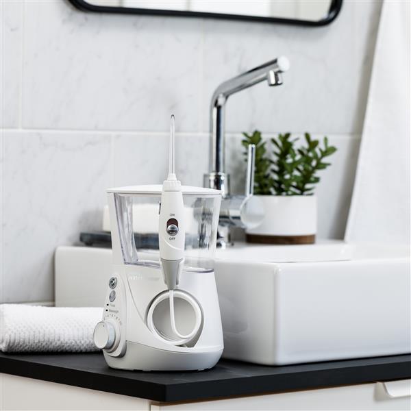 White Aquarius Professional Series Water Flosser WP-670 In Bathroom