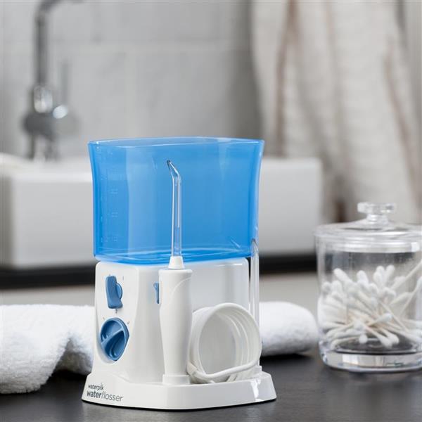 White Traveler Water Flosser WP-300 In Bathroom