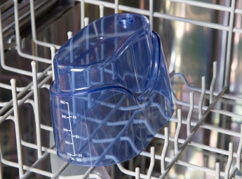 
Réservoir de l'hydropulseur dans le panier supérieur du lave-vaisselle