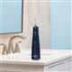 Hydropulseur portatif sans fil 1000 bleu sur un lavabo de salle de bain.