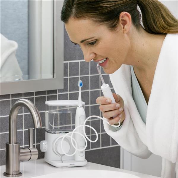 Using White Complete Care 9.0 Water Flosser Toothbrush