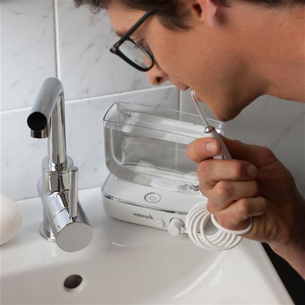 Using WF-04 White Sidekick Travel Water Flosser